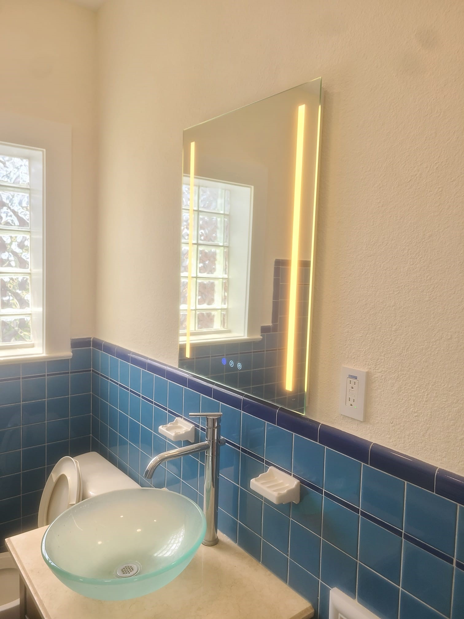 4703 Chenevert Street, Unit 2 Houston, TX 77004 - Photo 19 of 22 a bathroom with a toilet a sink and window