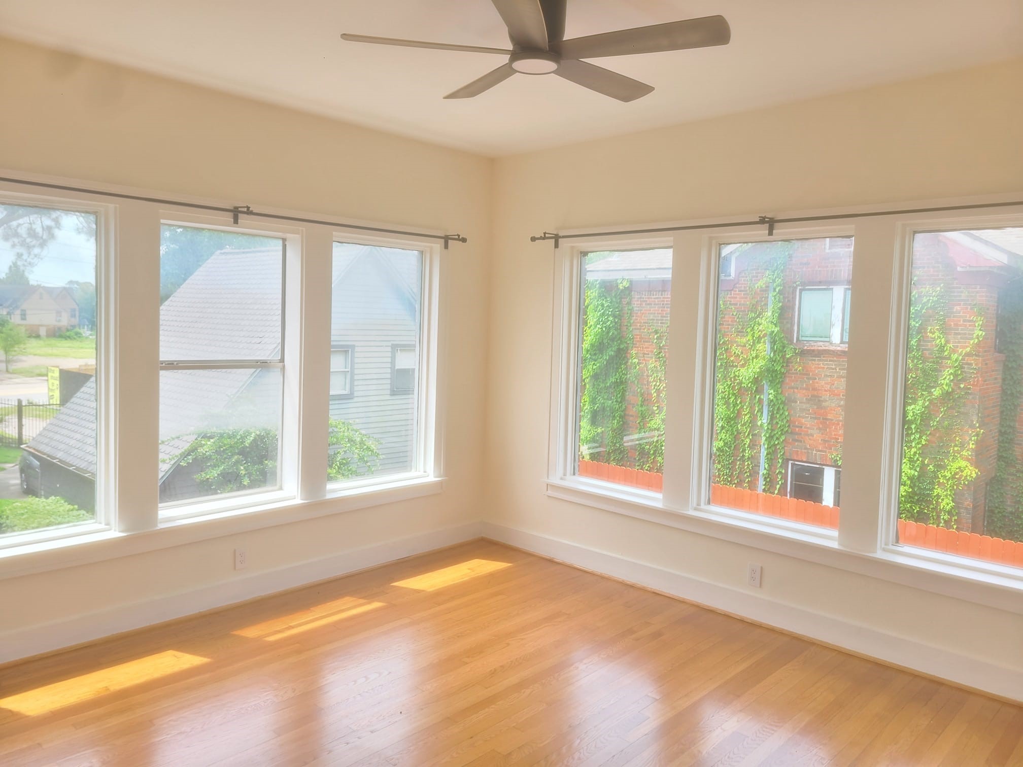 4703 Chenevert Street, Unit 2 Houston, TX 77004 - Photo 7 of 22 a view of an empty room with a window and kitchen view