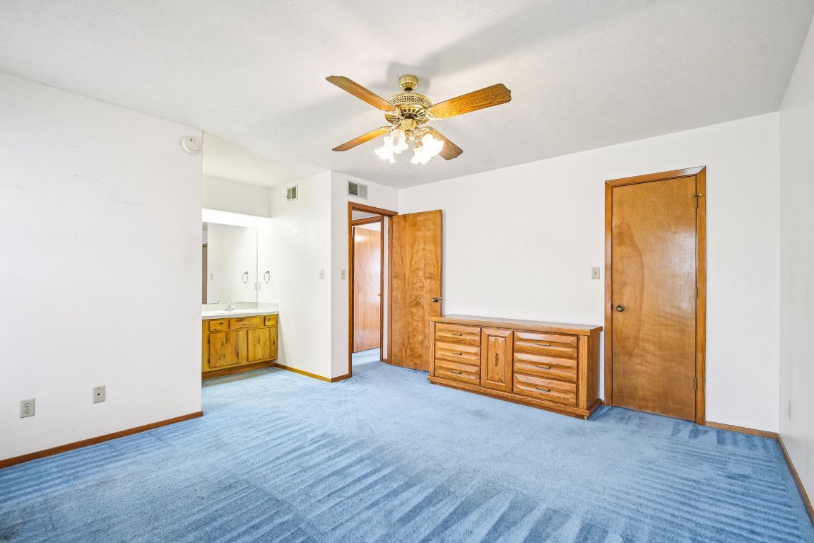 102 Stubblefield Drive Elgin, TX 78621 - Photo 18 of 39 wooden floor in an empty room with a window