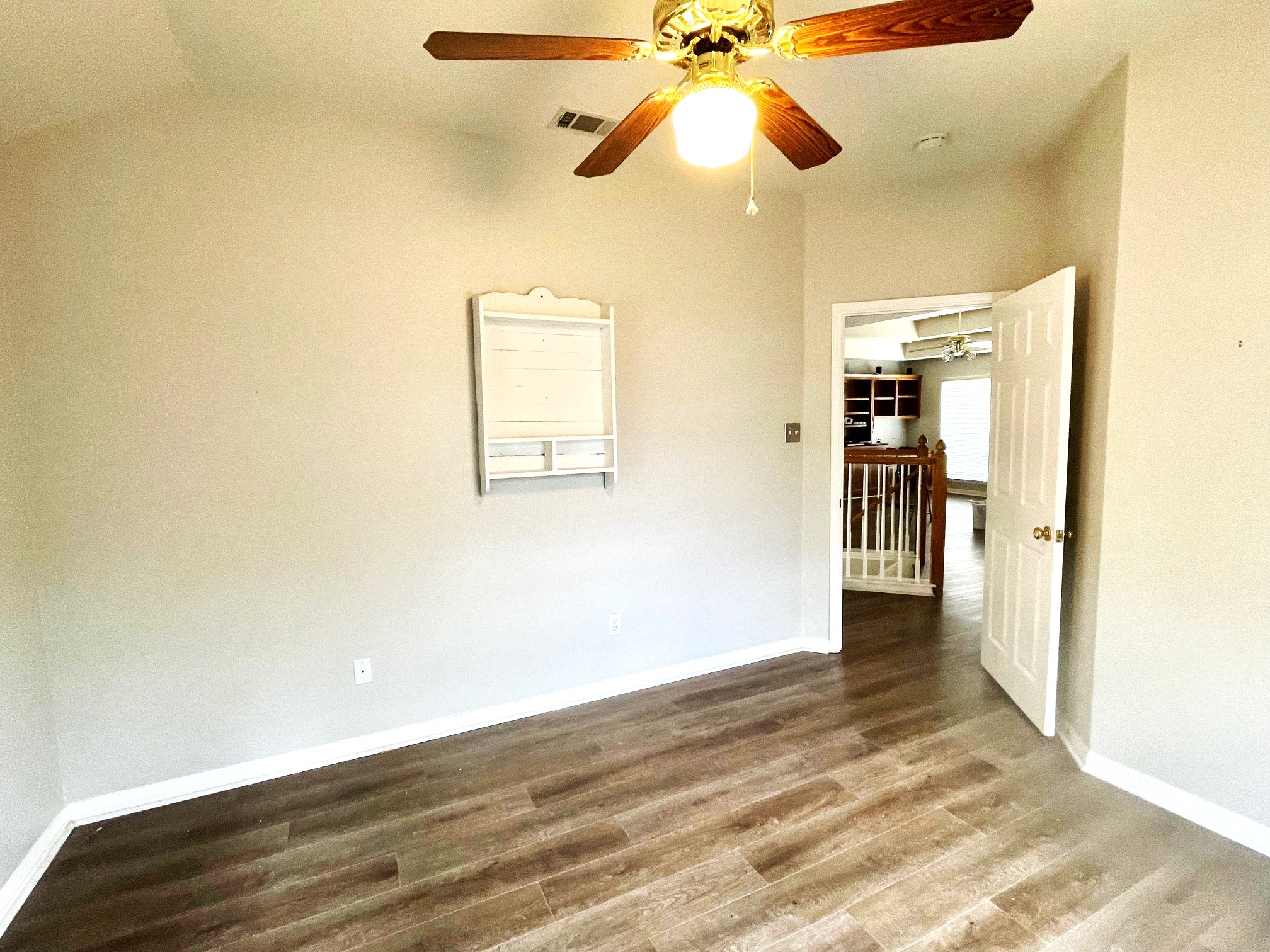 8504 Ephraim Road Austin, TX 78717 - Photo 16 of 16 Spare room with dark wood-type flooring and ceiling fan