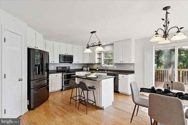 a view of a porch with a iron fence