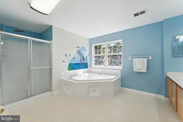 a view of walk in closet with window