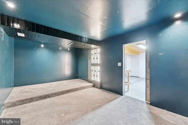 a utility room with sink dryer and washer