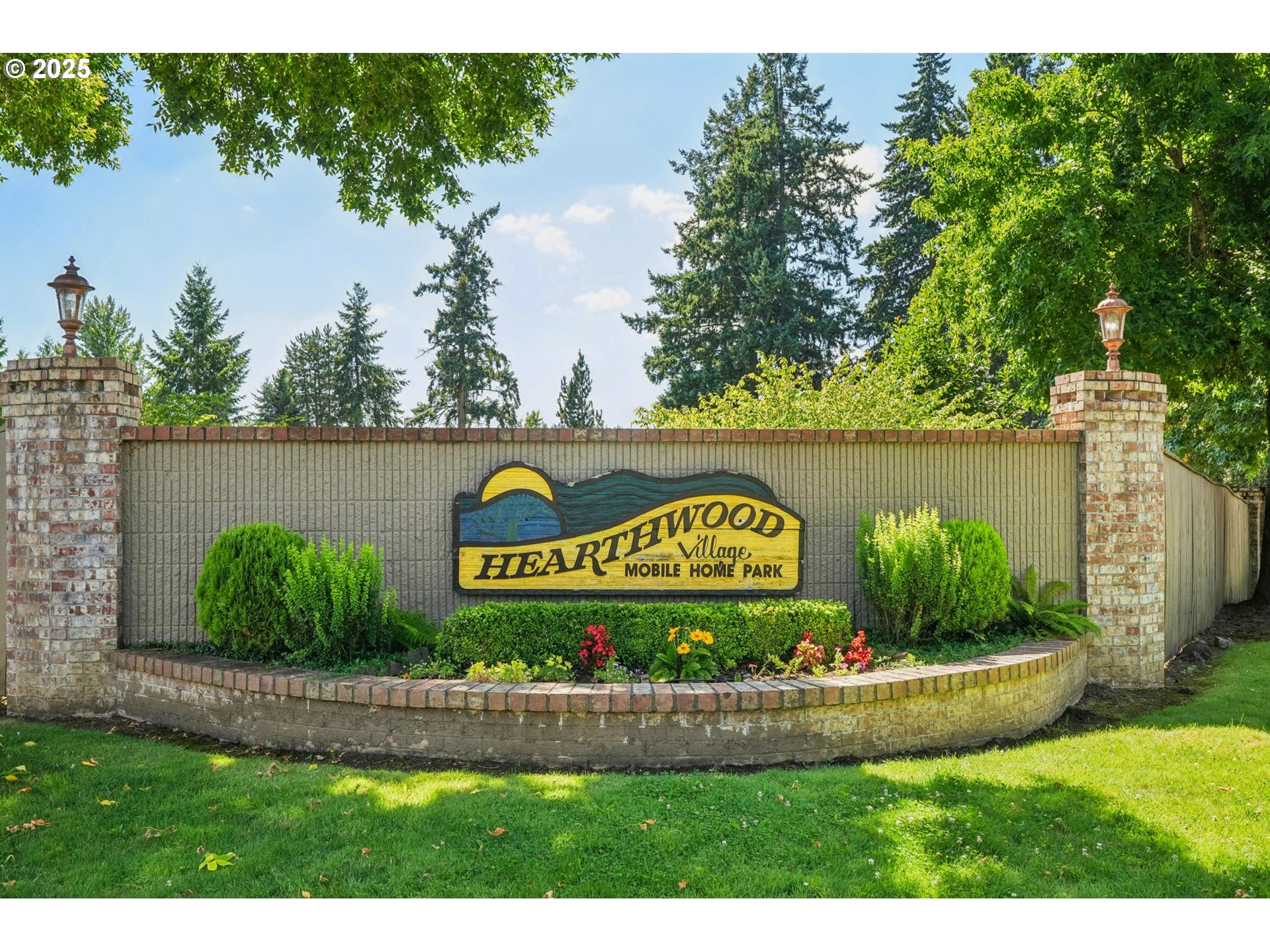 8434 Heritage Court, Unit 19 Clackamas, OR 97015 - Photo 26 of 28 a view of outdoor space with signage and flags