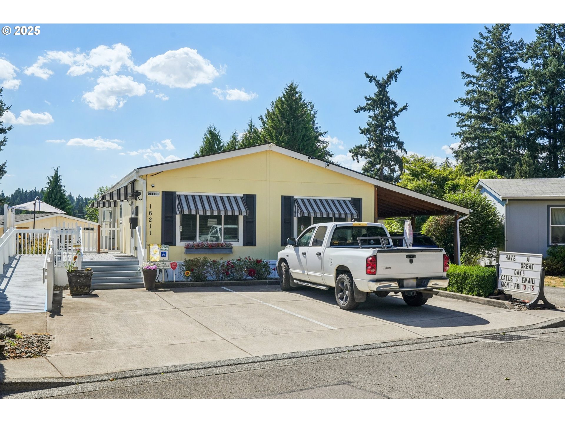 8434 Heritage Court, Unit 19 Clackamas, OR 97015 - Photo 27 of 28 a car parked in front of a house