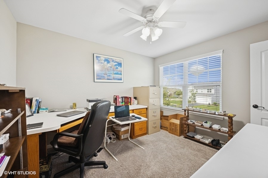 1683 Rockefeller Drive Mundelein, IL 60060 - Photo 17 of 25 a workspace with furniture and a large window
