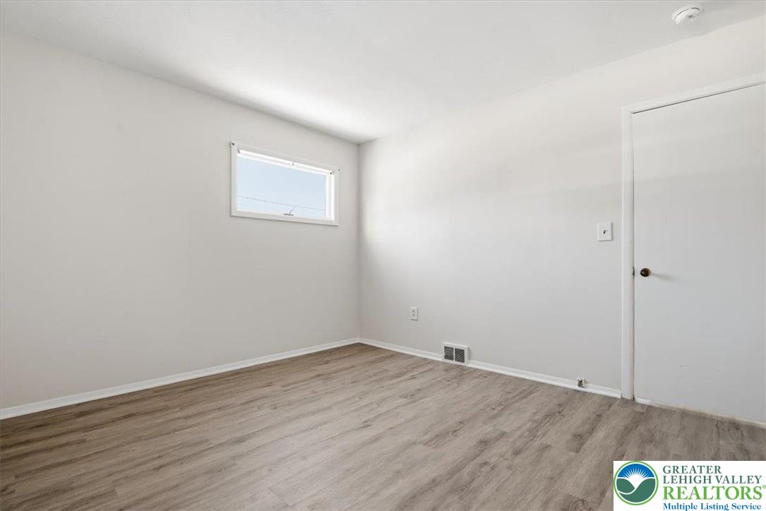 1333 Ridge Trail Easton, PA 18040 - Photo 14 of 34 a view of a room with wooden floor and white walls