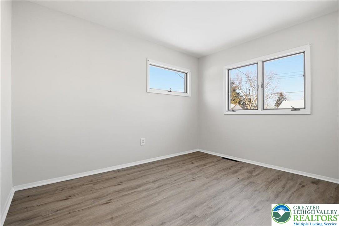 1333 Ridge Trail Easton, PA 18040 - Photo 18 of 34 a view of an empty room with wooden floor and a window