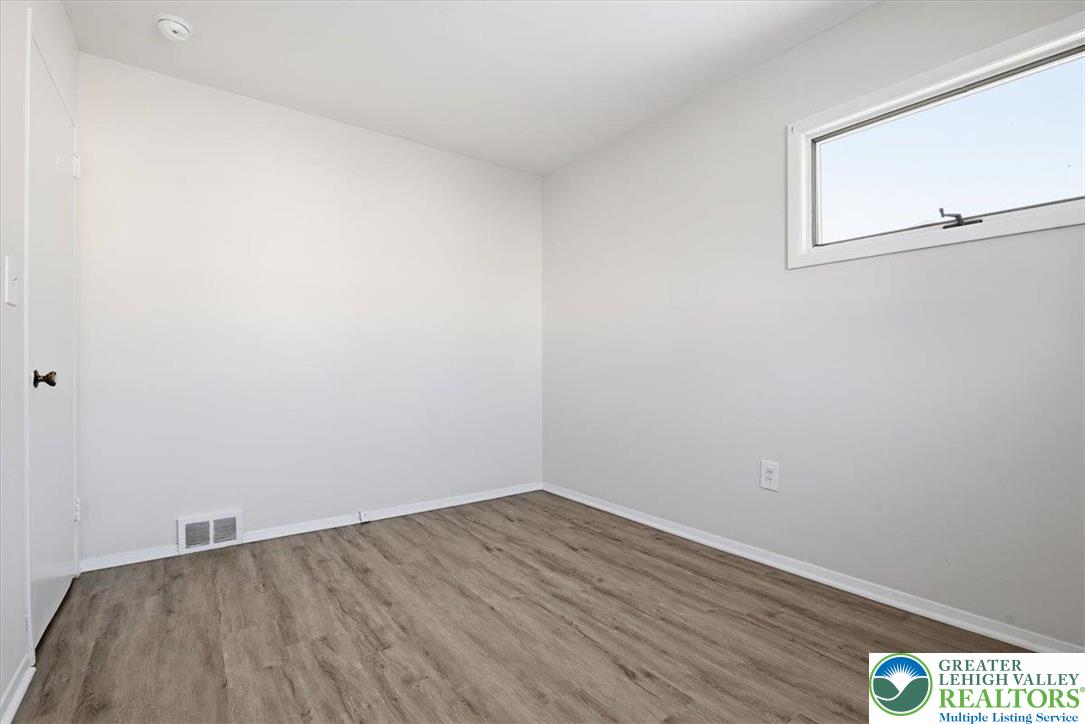 1333 Ridge Trail Easton, PA 18040 - Photo 20 of 34 a view of a room that has wooden floor and bench
