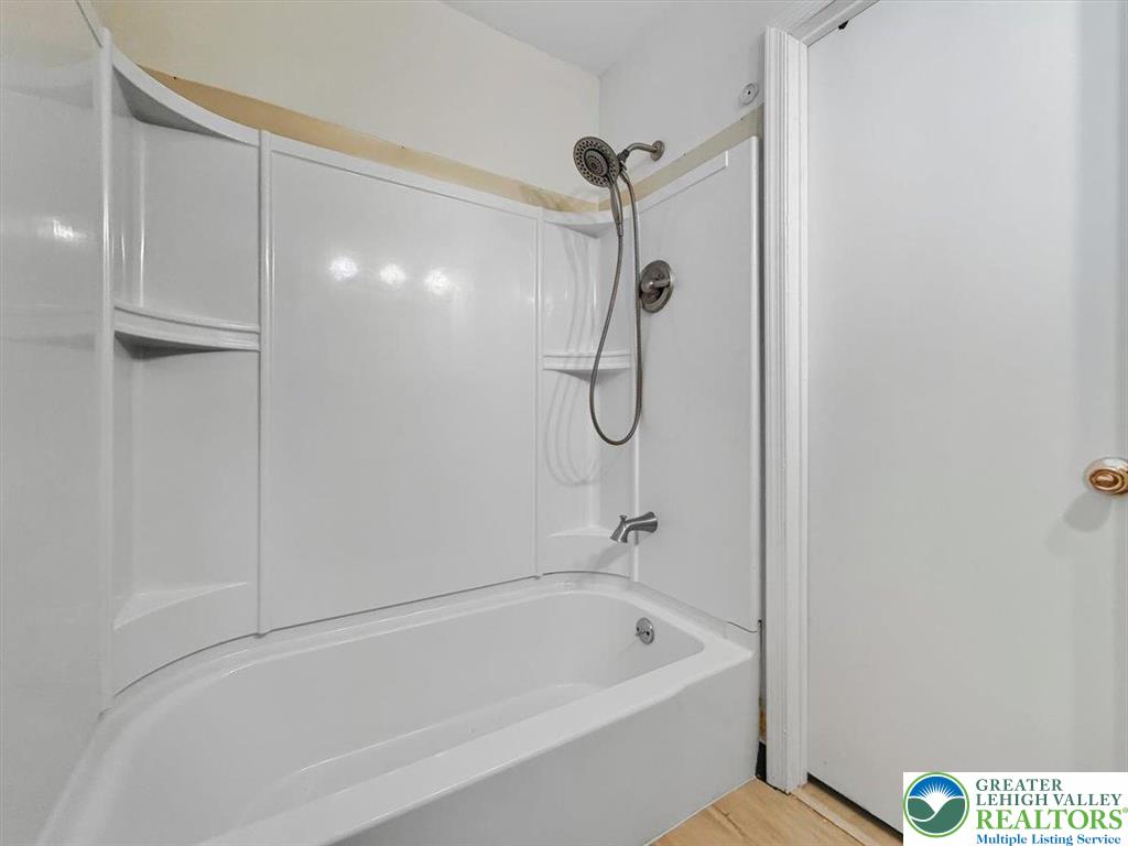 1333 Ridge Trail Easton, PA 18040 - Photo 22 of 34 a bathroom with a bathtub and a shower