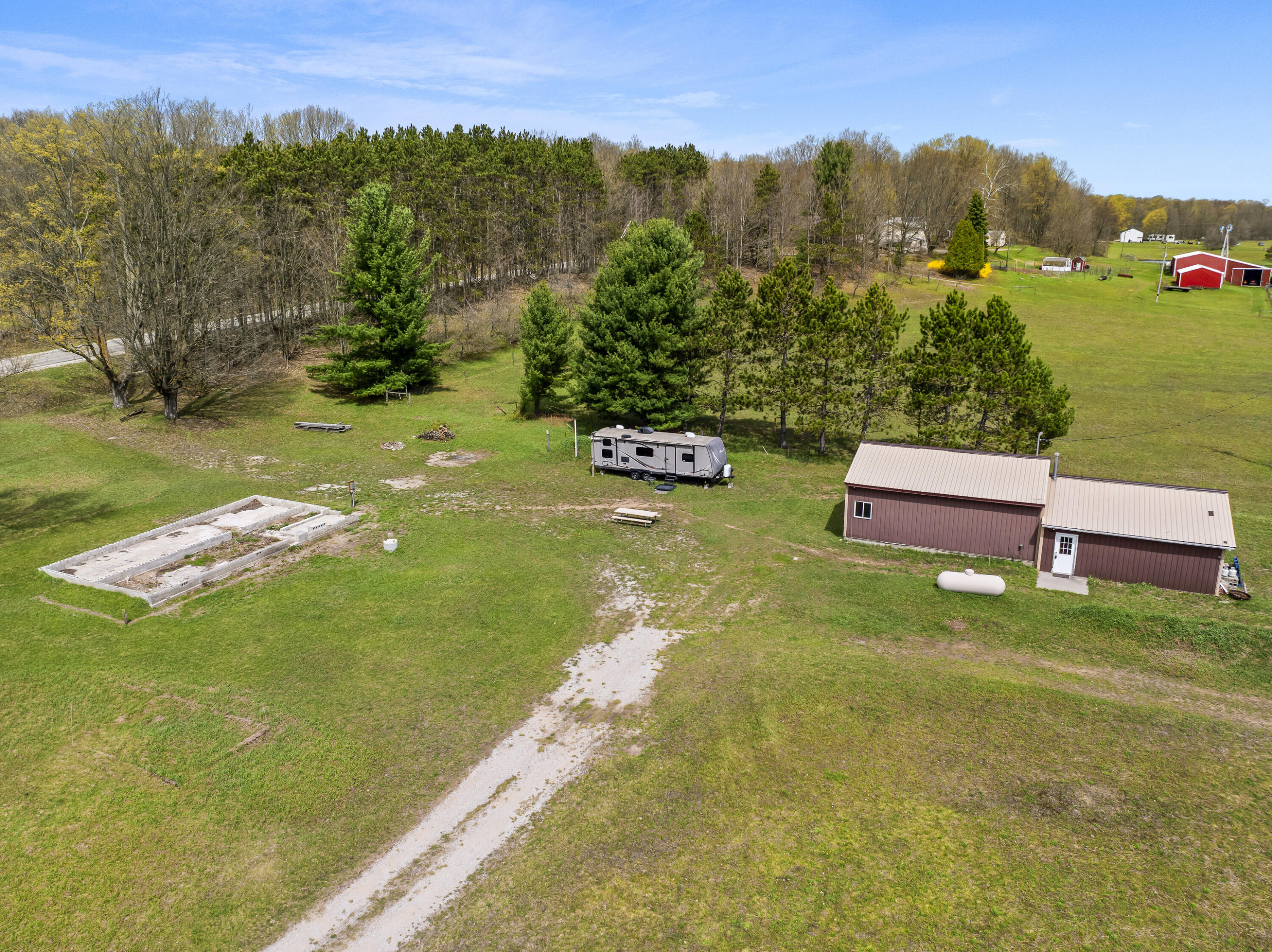 167 North Pioneer Road Beulah, MI 49617 - Photo 2 of 14 DJI_20260427121859_0095_D
