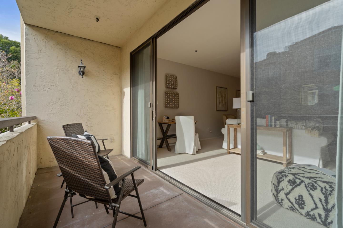 525 Almer Road, Unit 210 Burlingame, CA 94010 - Photo 13 of 36 a view of a room with furniture and front door