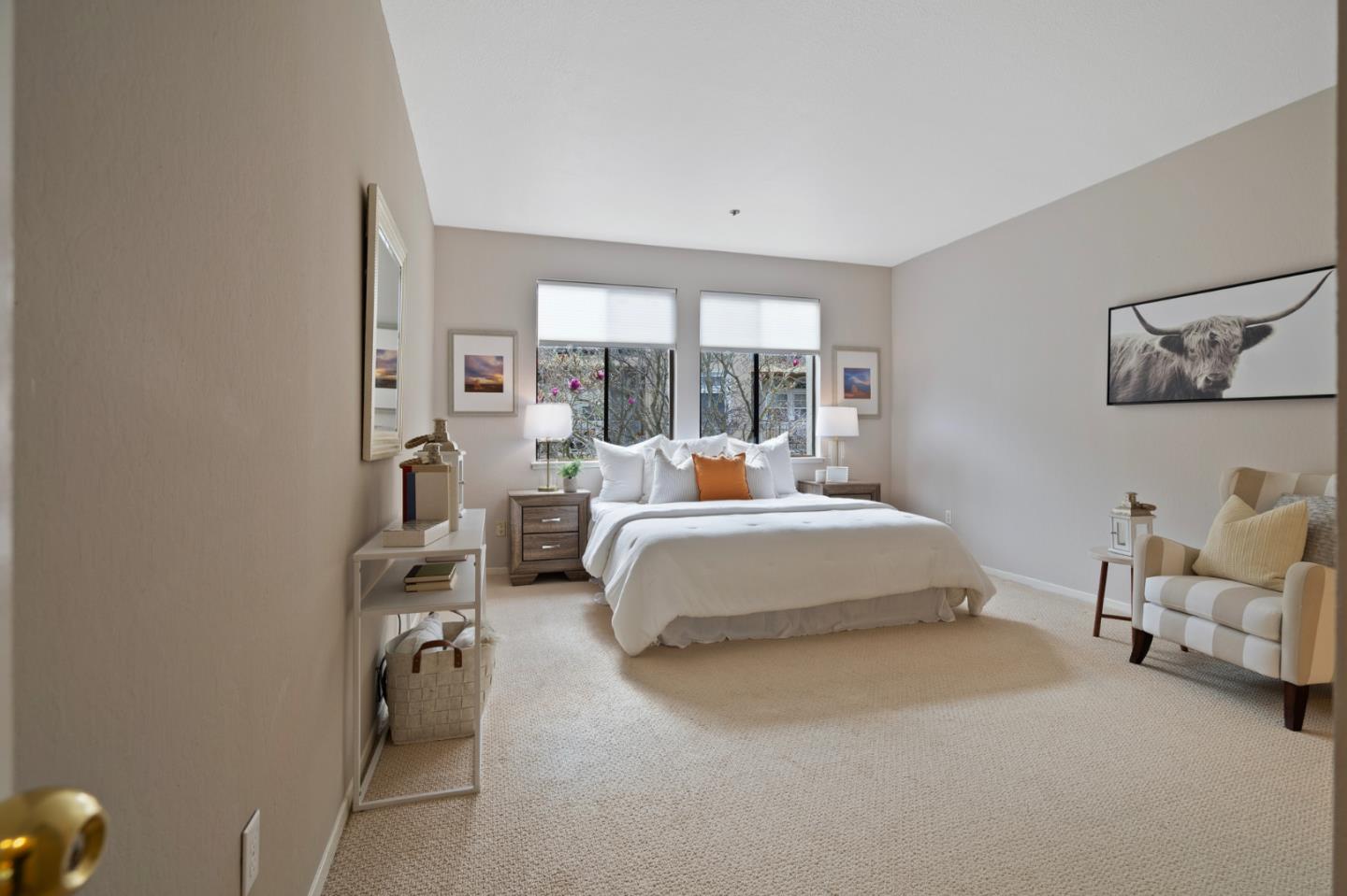 525 Almer Road, Unit 210 Burlingame, CA 94010 - Photo 21 of 36 a bedroom with a bed and large window