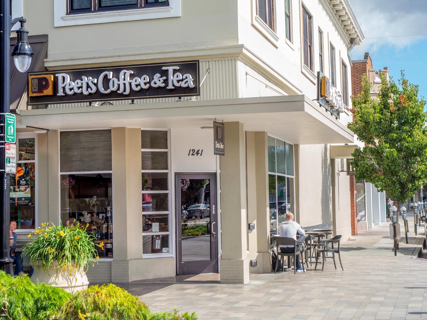 525 Almer Road, Unit 210 Burlingame, CA 94010 - Photo 30 of 36 a view of a building with a outdoor seating area