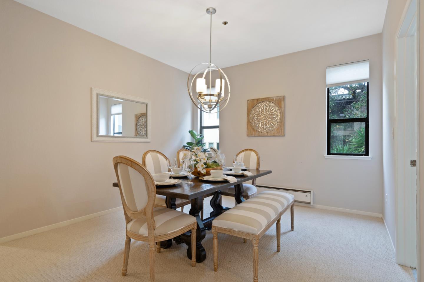 525 Almer Road, Unit 210 Burlingame, CA 94010 - Photo 6 of 36 a dining room with furniture a rug and a window