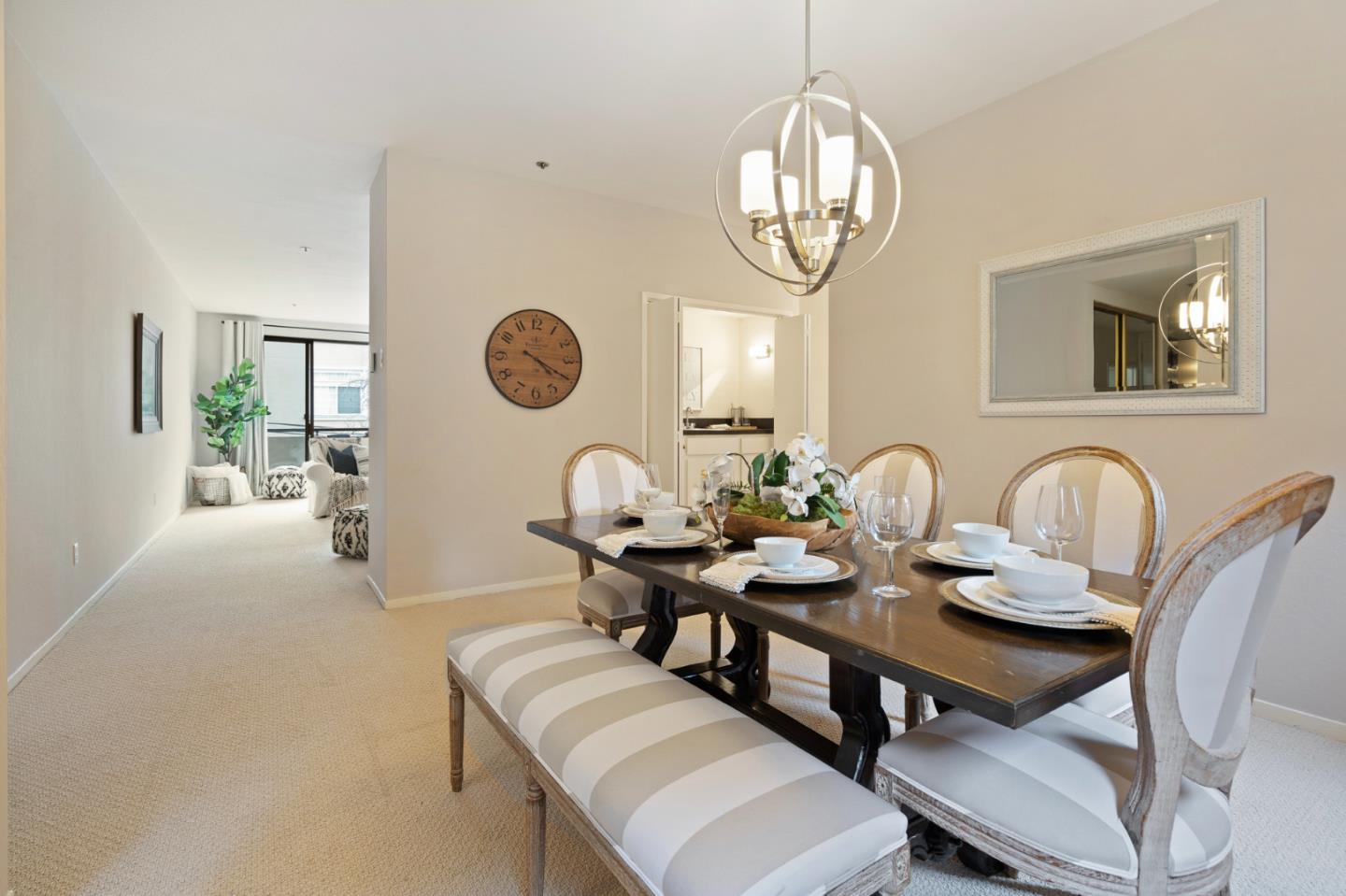 525 Almer Road, Unit 210 Burlingame, CA 94010 - Photo 7 of 36 a view of a dining room with furniture and a chandelier