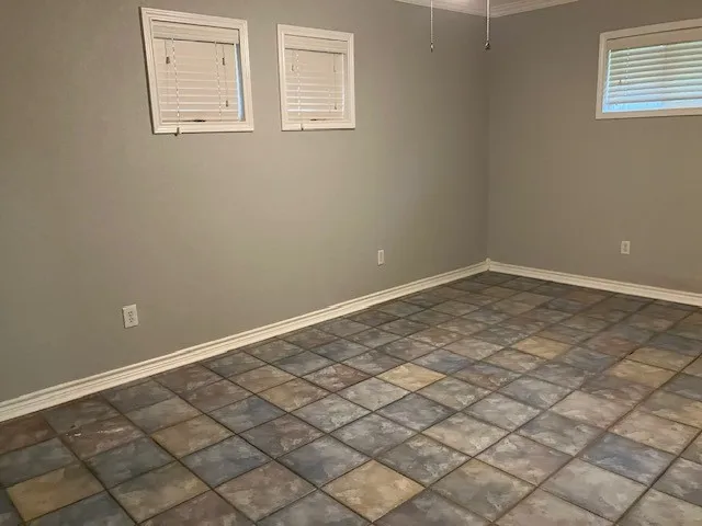 an empty room with windows