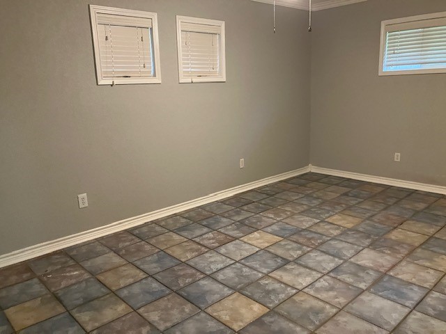 111 Shadylyn Drive Conroe, TX 77304 - Photo 10 of 18 an empty room with windows