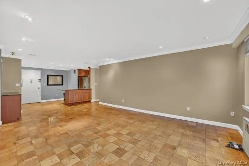 a kitchen with stainless steel appliances granite countertop a stove and cabinets