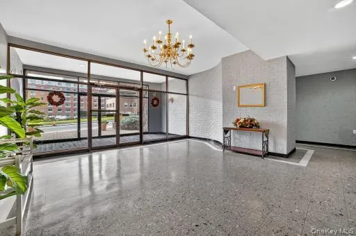 a view of an entryway with a flower pot