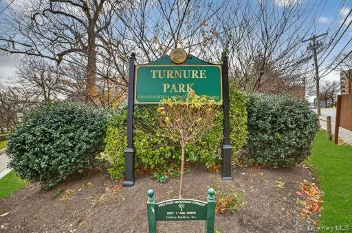 a sign on the side of a road