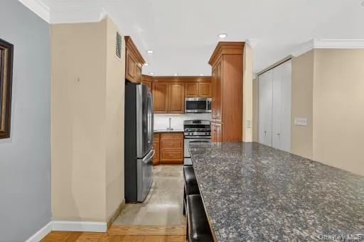 a view of a kitchen from the hallway