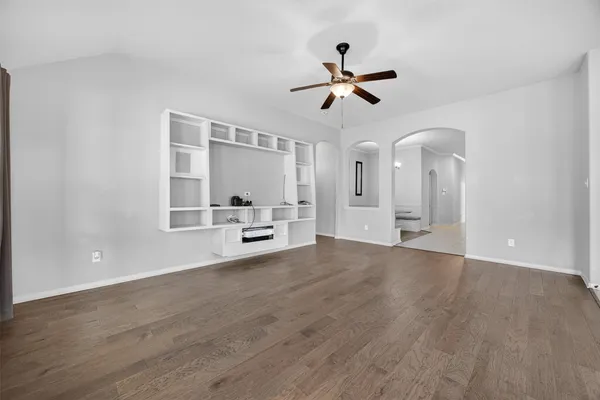 a living room with furniture and window