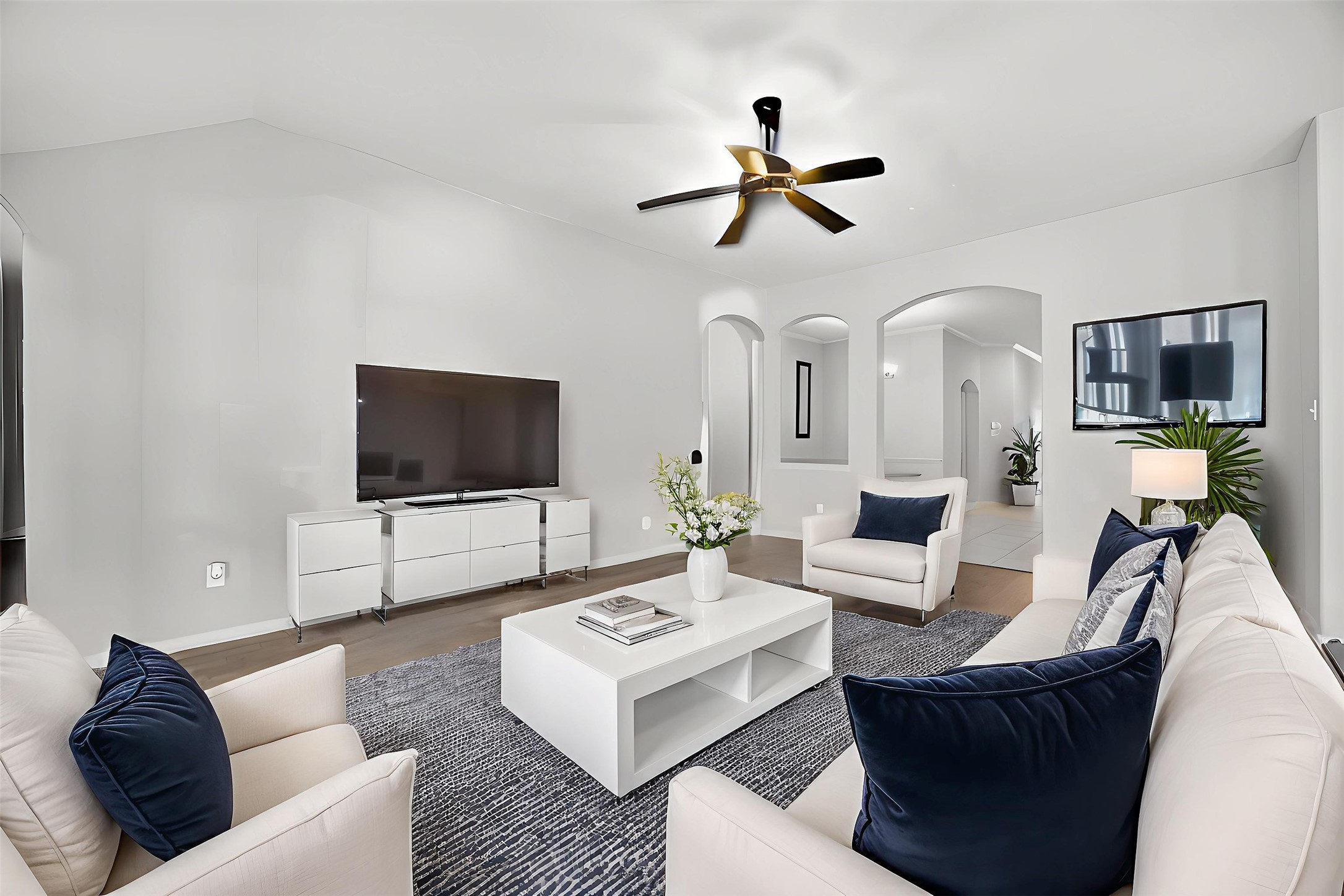 2009 Scissor Tail Road Pearland, TX 77581 - Photo 13 of 41 a living room with furniture and a flat screen tv