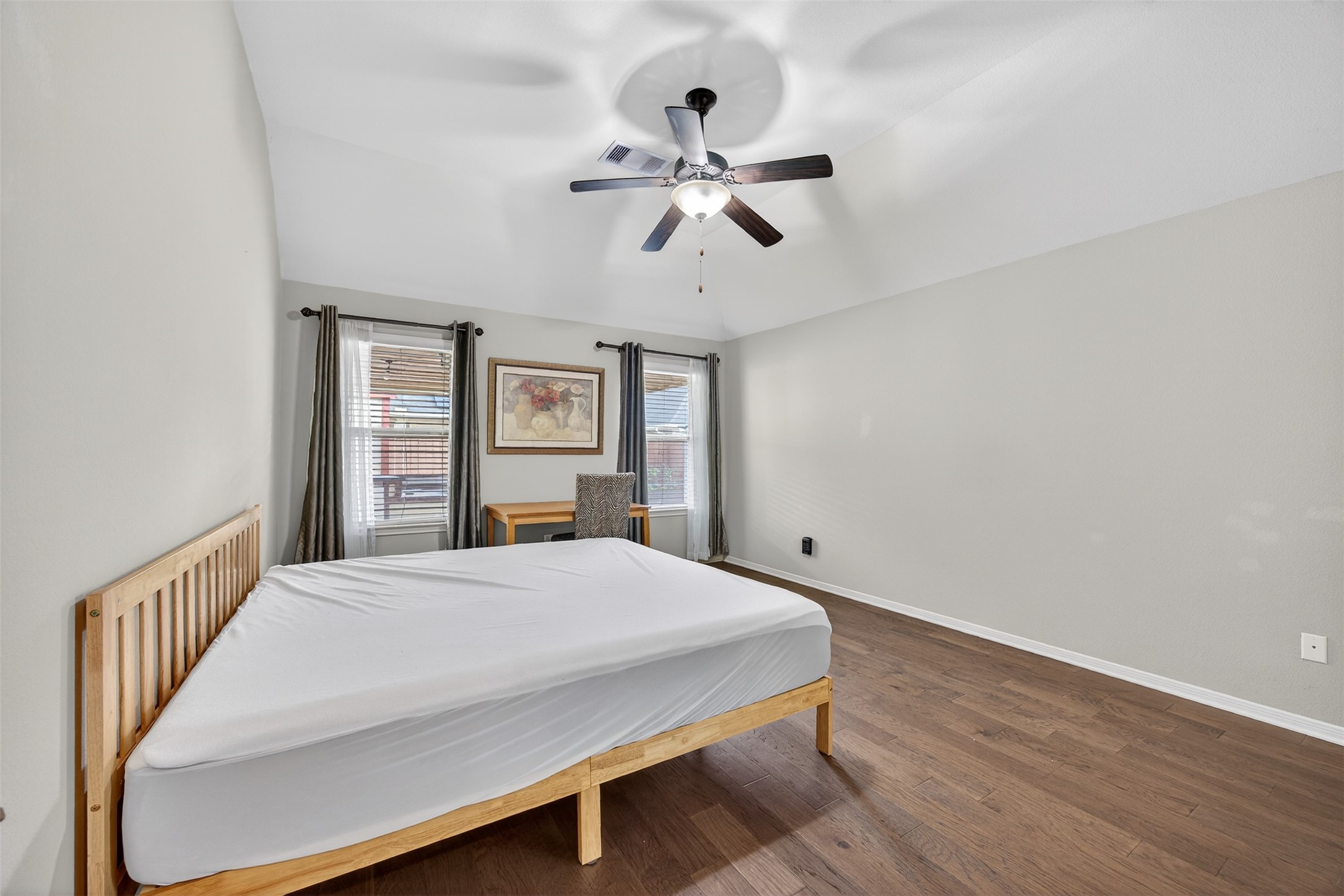 2009 Scissor Tail Road Pearland, TX 77581 - Photo 24 of 41 a bedroom with a large bed and a window