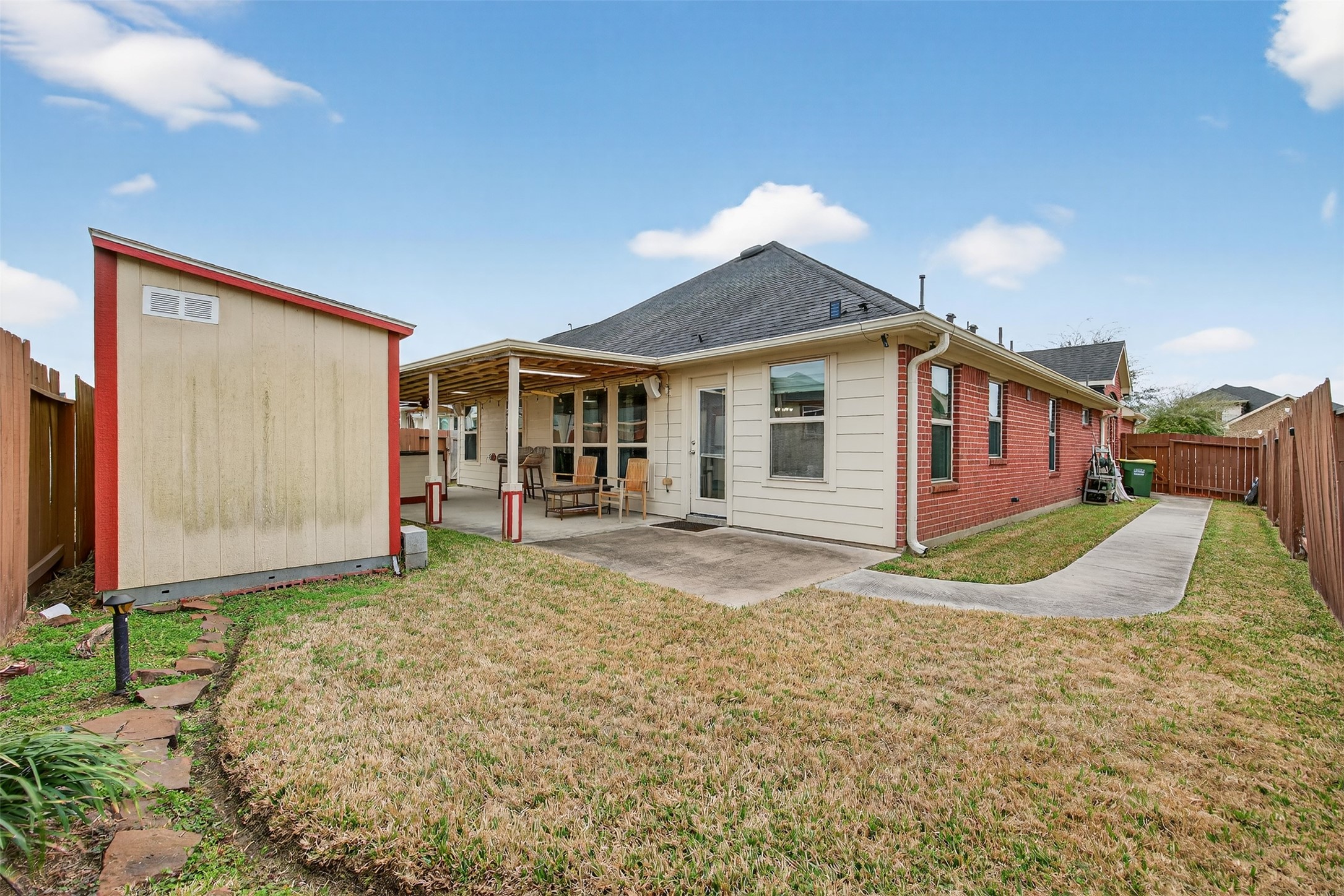 2009 Scissor Tail Road Pearland, TX 77581 - Photo 36 of 41 a view of a back yard of the house
