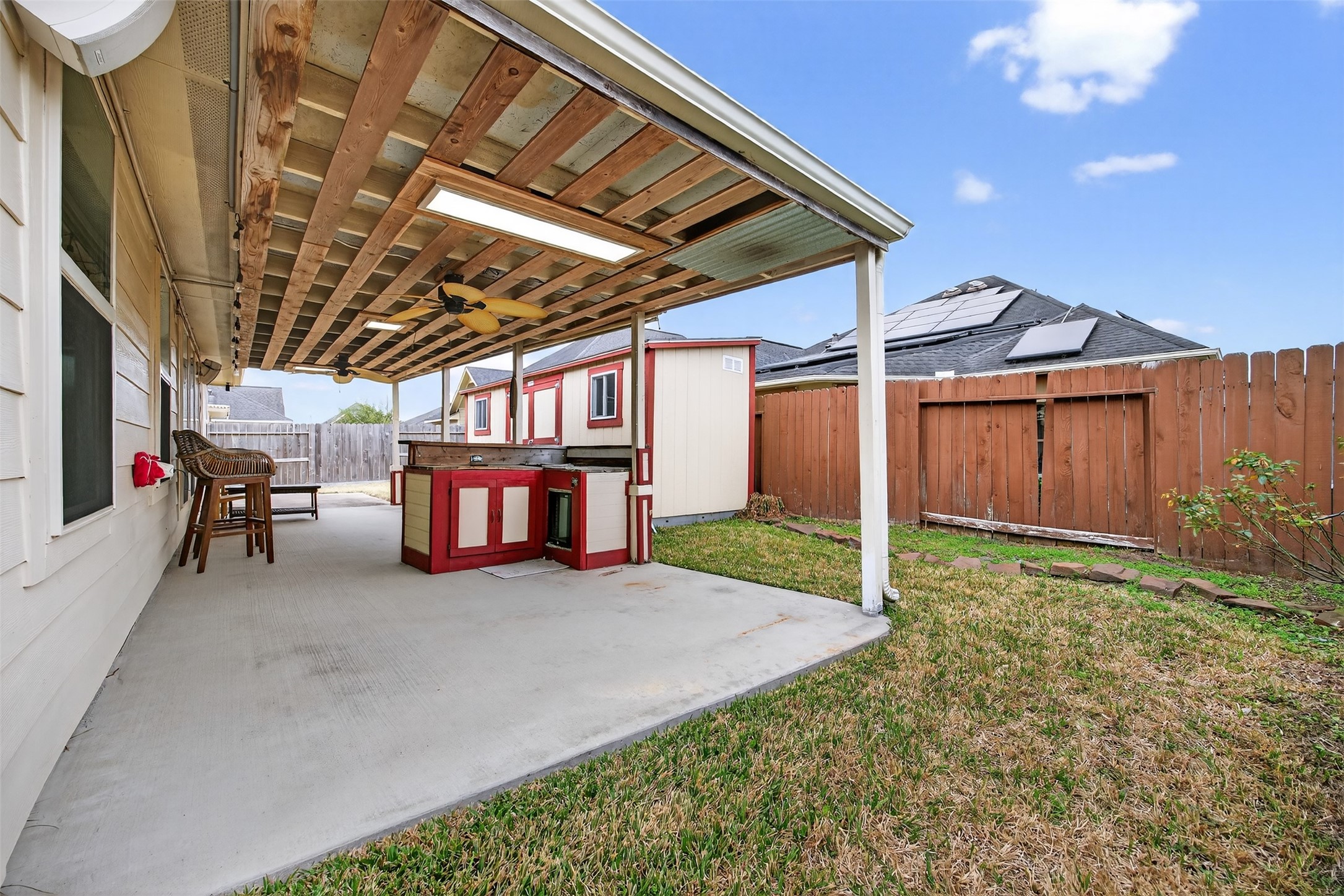 2009 Scissor Tail Road Pearland, TX 77581 - Photo 37 of 41 a view of a house with backyard and porch