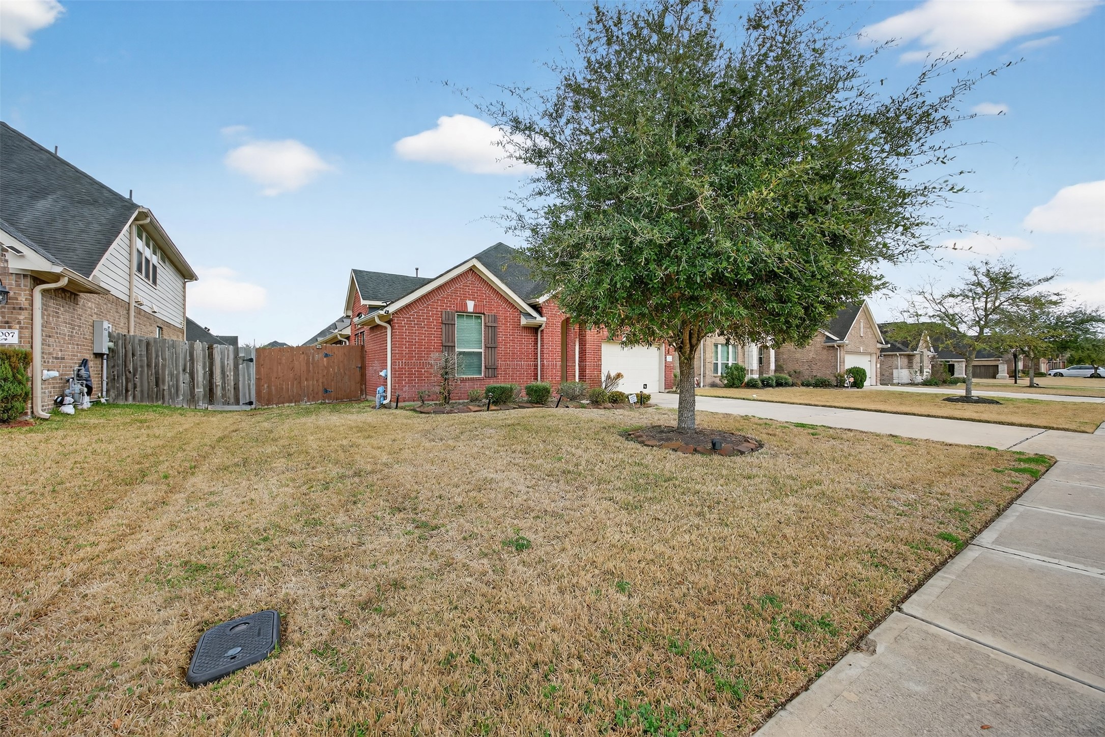 2009 Scissor Tail Road Pearland, TX 77581 - Photo 5 of 41 a house view with a outdoor space
