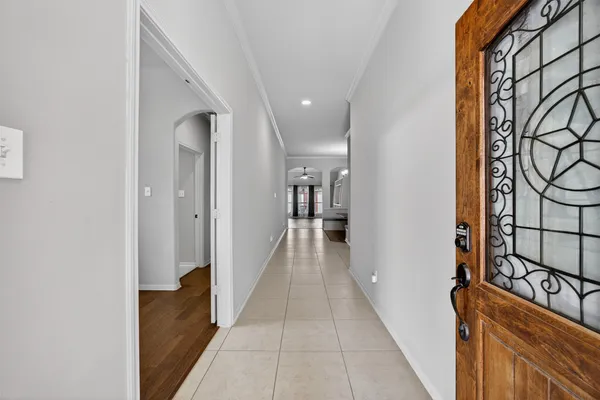 wooden floor with a bathroom
