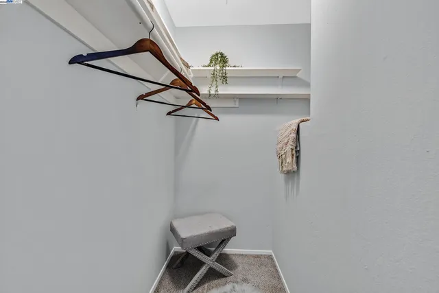 a view of a room with rack on the wall