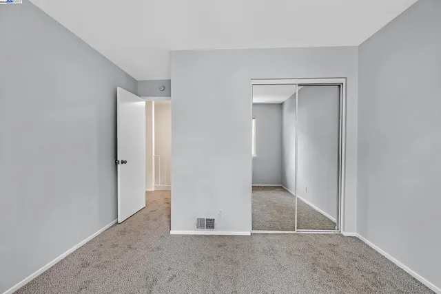 wooden floor and closet in a room