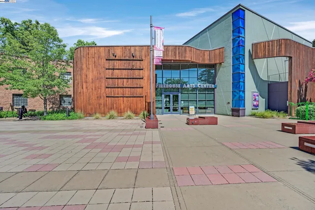 a view of a building with a street
