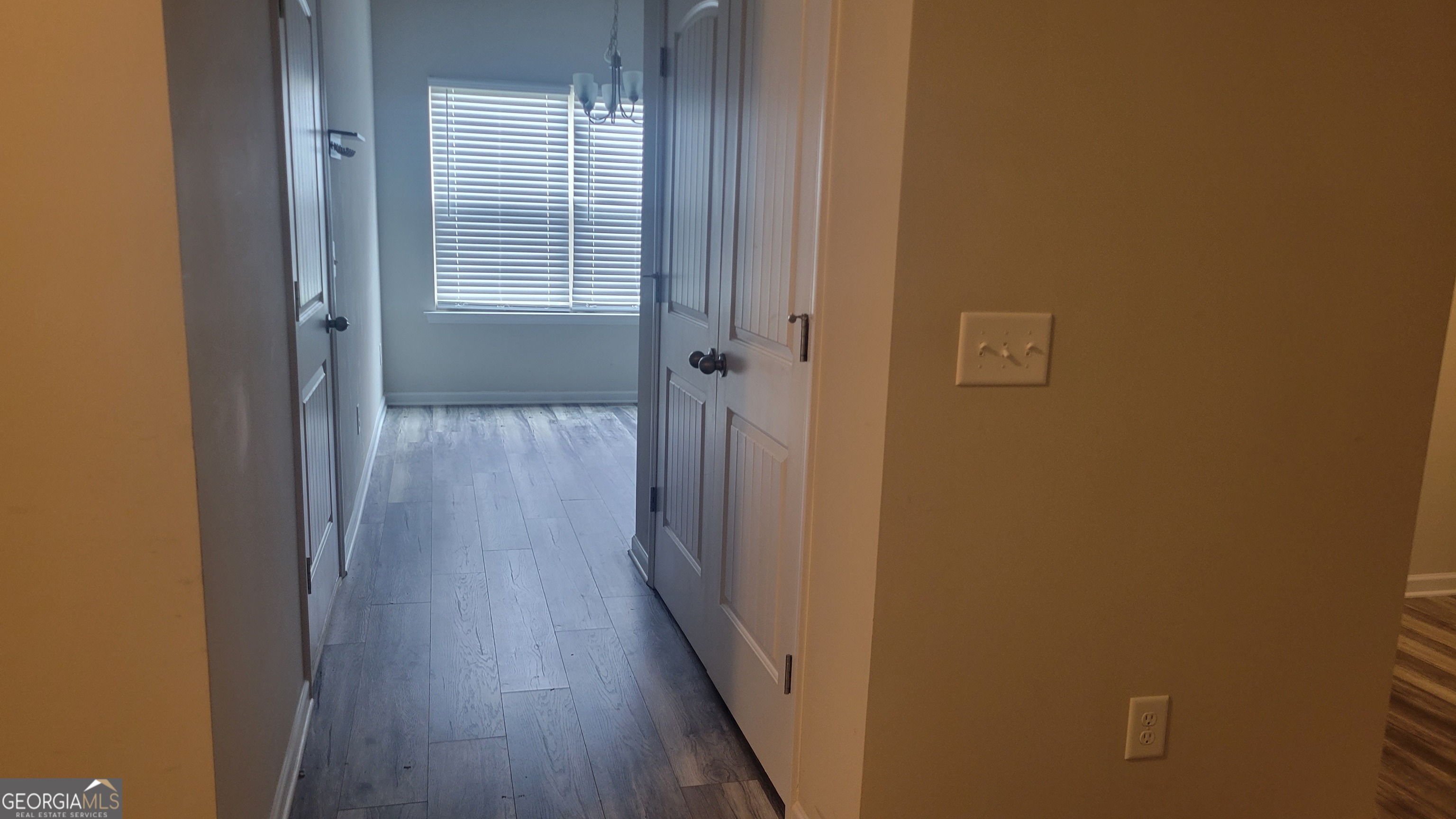 10 Bayberry Circle Southwest Rome, GA 30165 - Photo 30 of 38 a view of a hallway with wooden floor and a bathroom