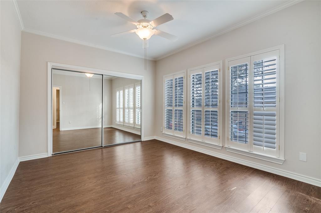 6027 High Court Place Dallas, TX 75254 - Photo 19 of 26 wooden floor in an empty room with a window
