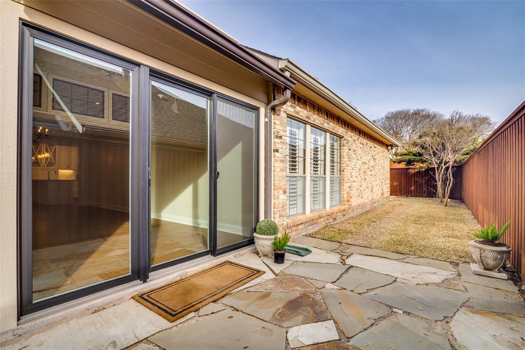 6027 High Court Place Dallas, TX 75254 - Photo 23 of 26 a view of house with backyard
