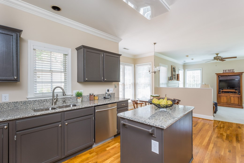 11817 Radner Way Raleigh, NC 27613 - Photo 15 of 15 This view of the kitchen shows the Island and there is a huge pantry as well. Open floor plan makes entertaining easy! Kitchen