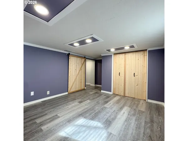 a view of an empty room and window