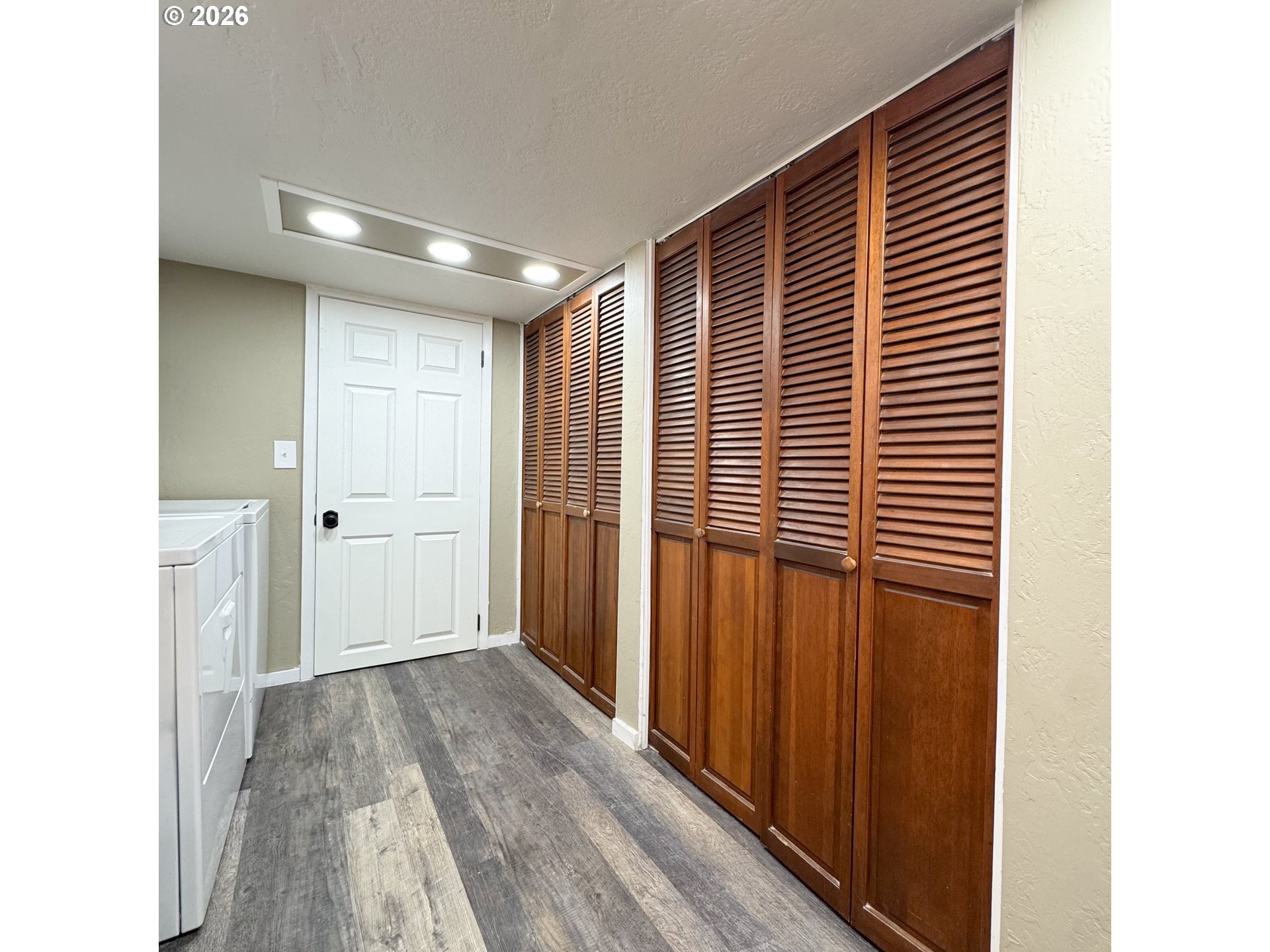 2414 3rd Street Baker City, OR 97814 - Photo 17 of 23 a view of a hallway with wooden floor