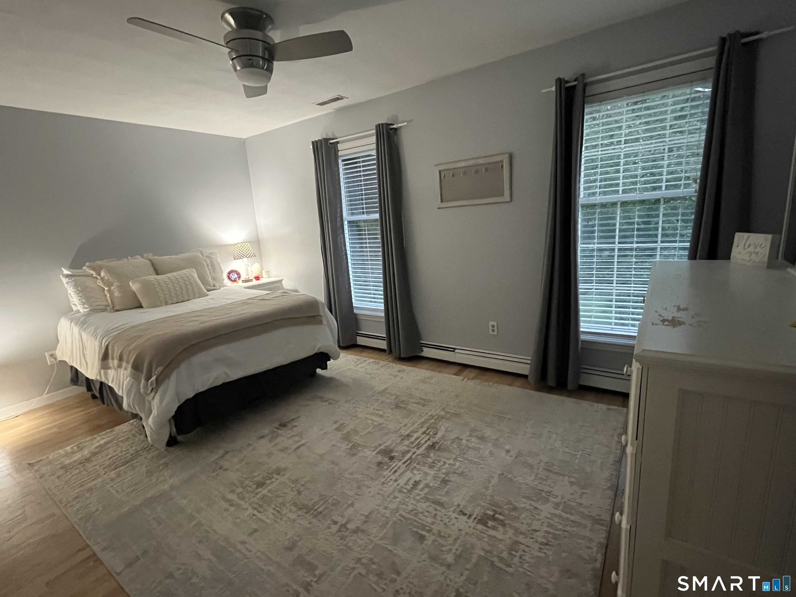 47 Merwin Brook Road Brookfield, CT 06804 - Photo 16 of 29 a spacious bedroom with a bed and a window