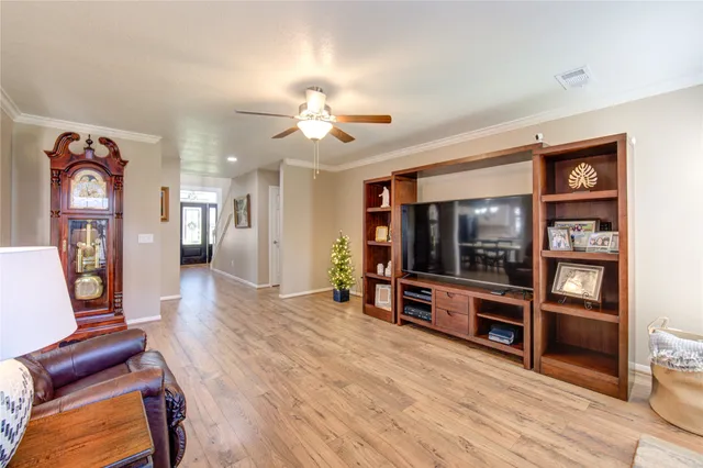 a living room with furniture and a table