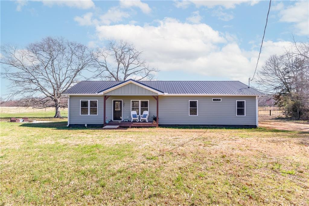 a front view of a house with yard
