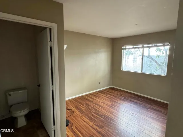 a view of a room that has a window in it