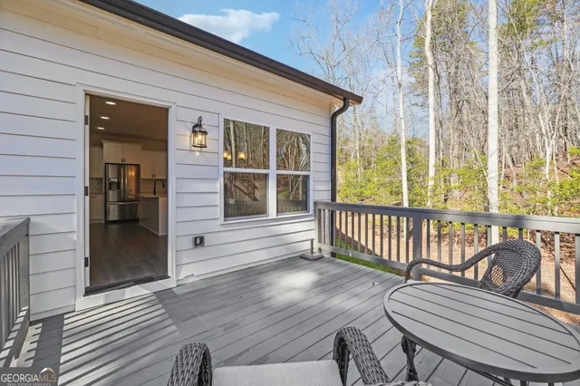 a spacious bedroom with a bed and window