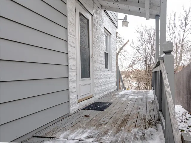 a view of a house with a wooden door