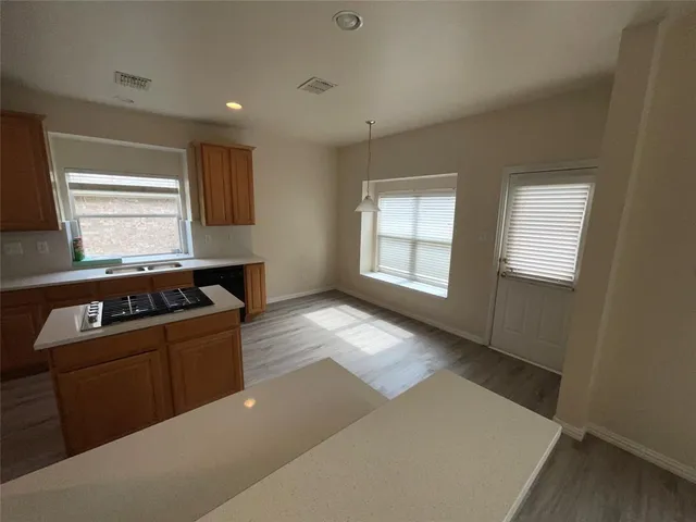 an empty room with windows