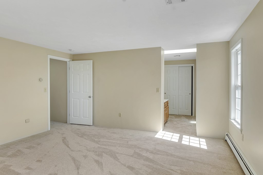 307 Ridgefield Circle, Unit A Clinton, MA 01510 - Photo 27 of 42 a view of an empty room and window